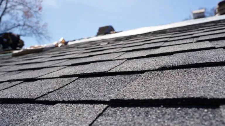 Installation of shingle roof by TopLine Roofing.