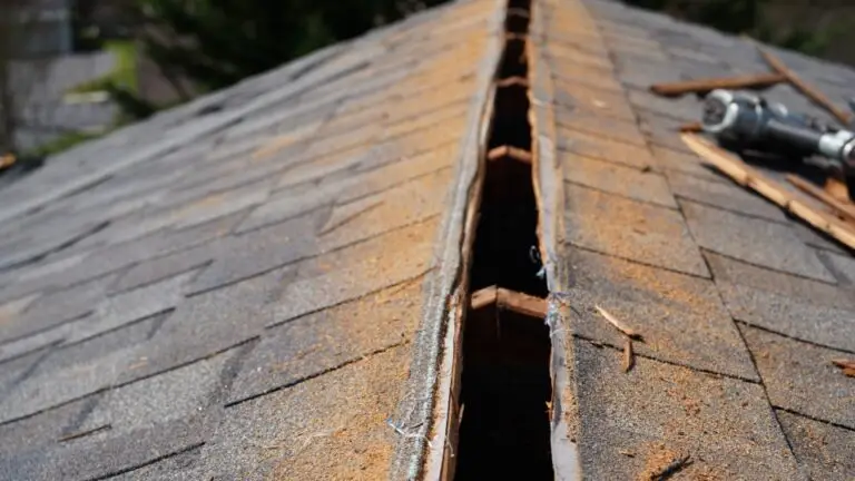 TopLine Roofing working on a ridge vent.