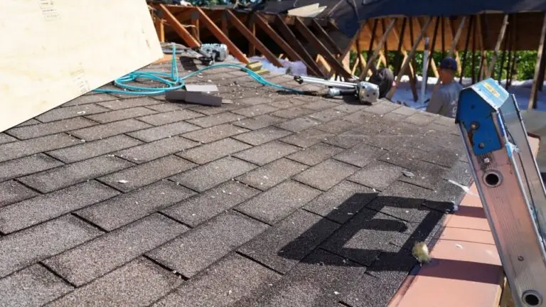 Three-tab shingles removal to prepare for new shingles in Kettering, MD by TopLine Roofing.