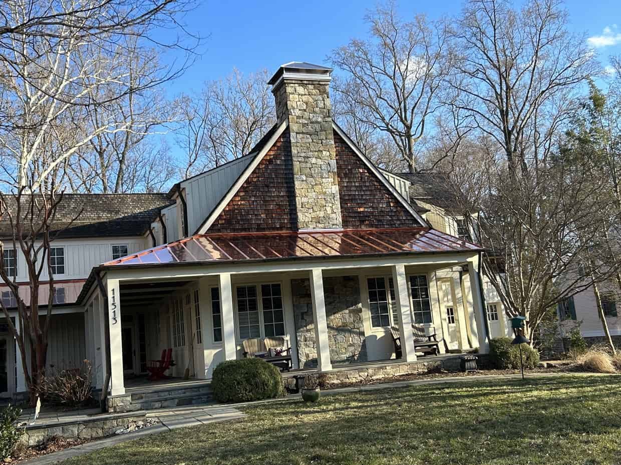 Charming house with stone chimney and sunny porch