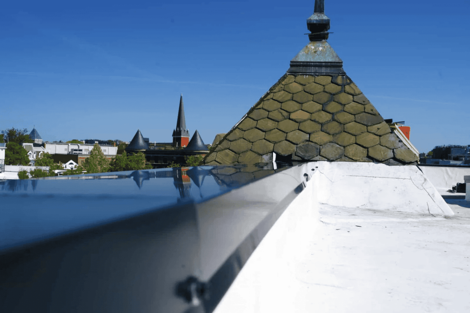 Rooftop view with spire and clear sky